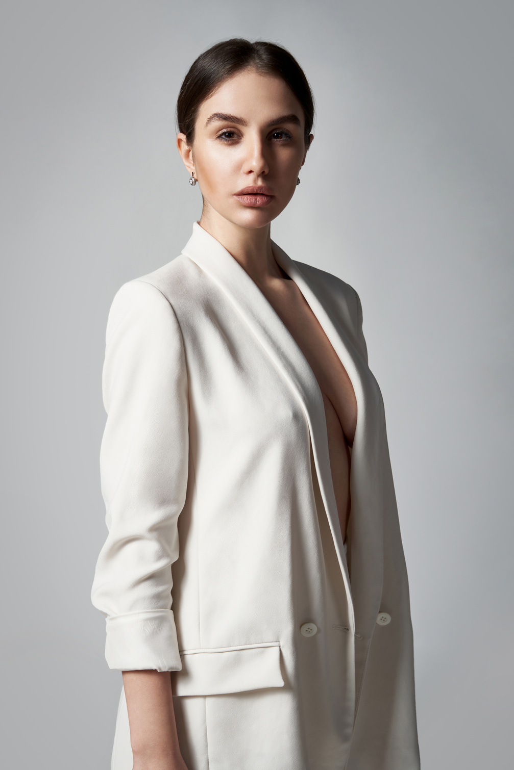 Fashion Portrait of Woman in White Blazer